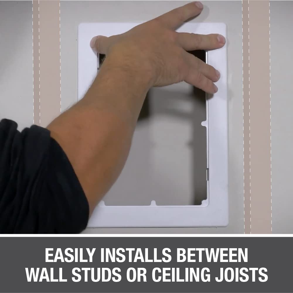 White rectangular wall access panel with open frame opening, hand demonstrating placement on wall studs.