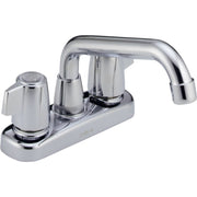 Chrome two-handle laundry faucet with curved spout and blade-style handles on white base.