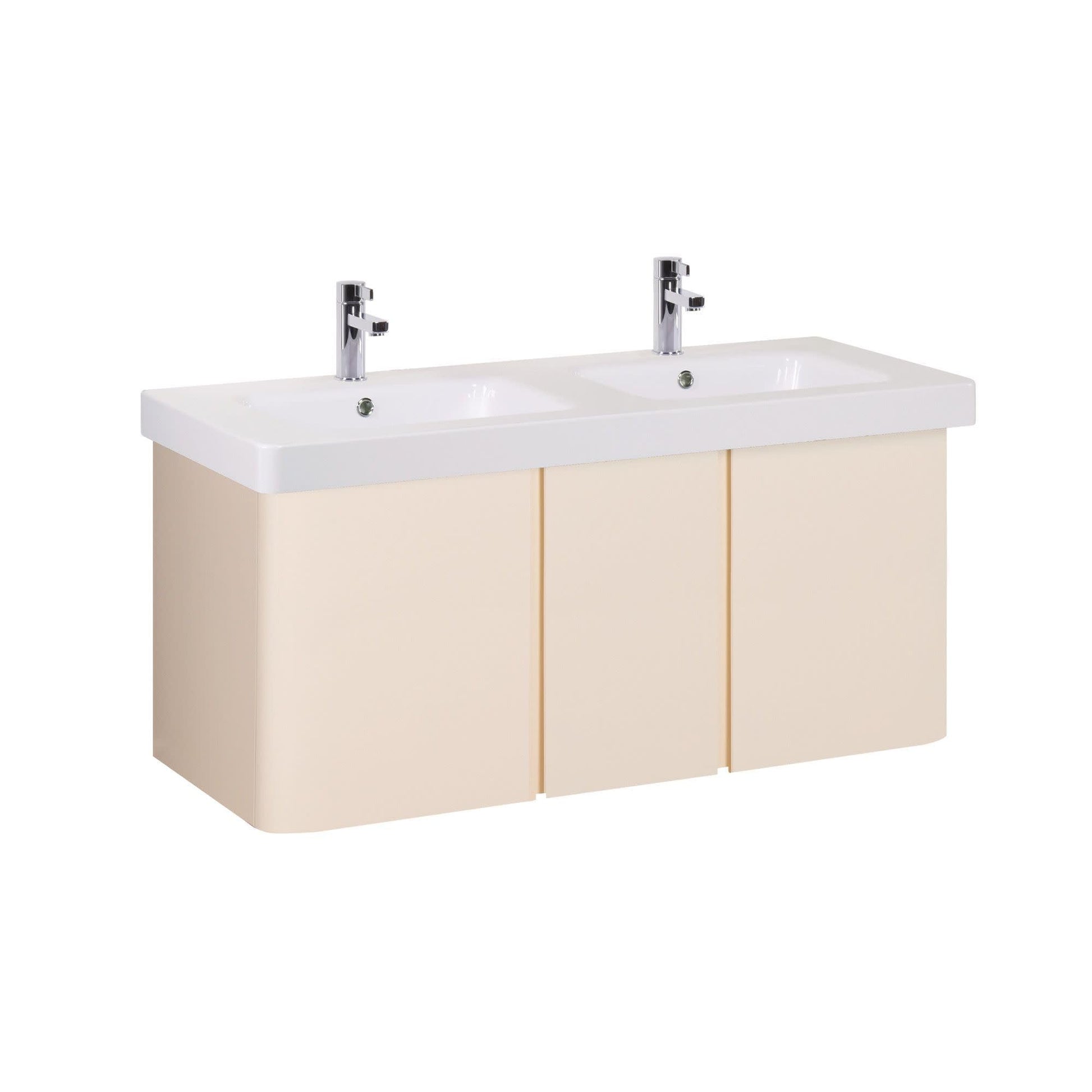 Dual chrome faucets mounted on white rectangular sink basin above cream cabinet with three doors.