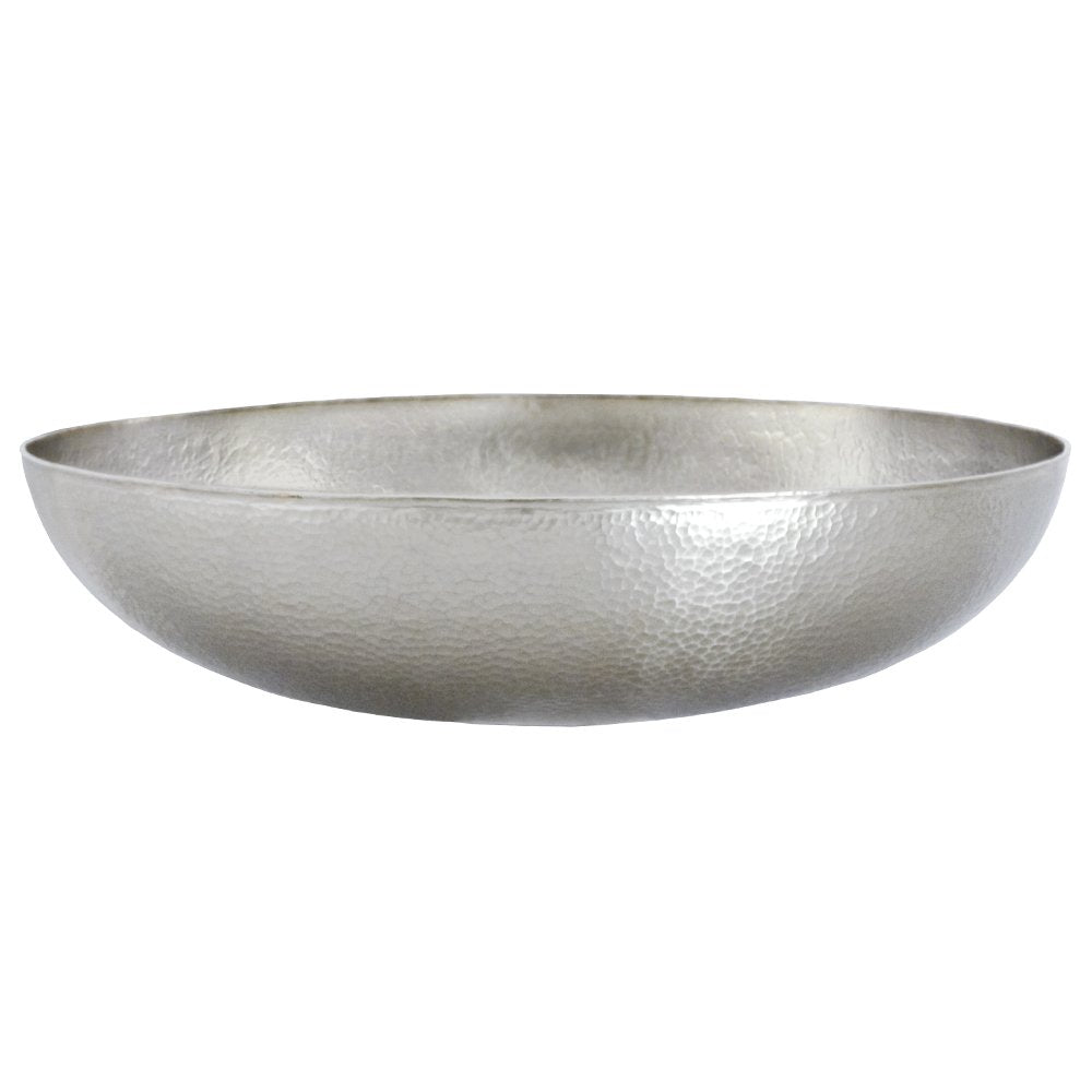 Hammered copper vessel sink with wide oval bowl and textured metallic surface.