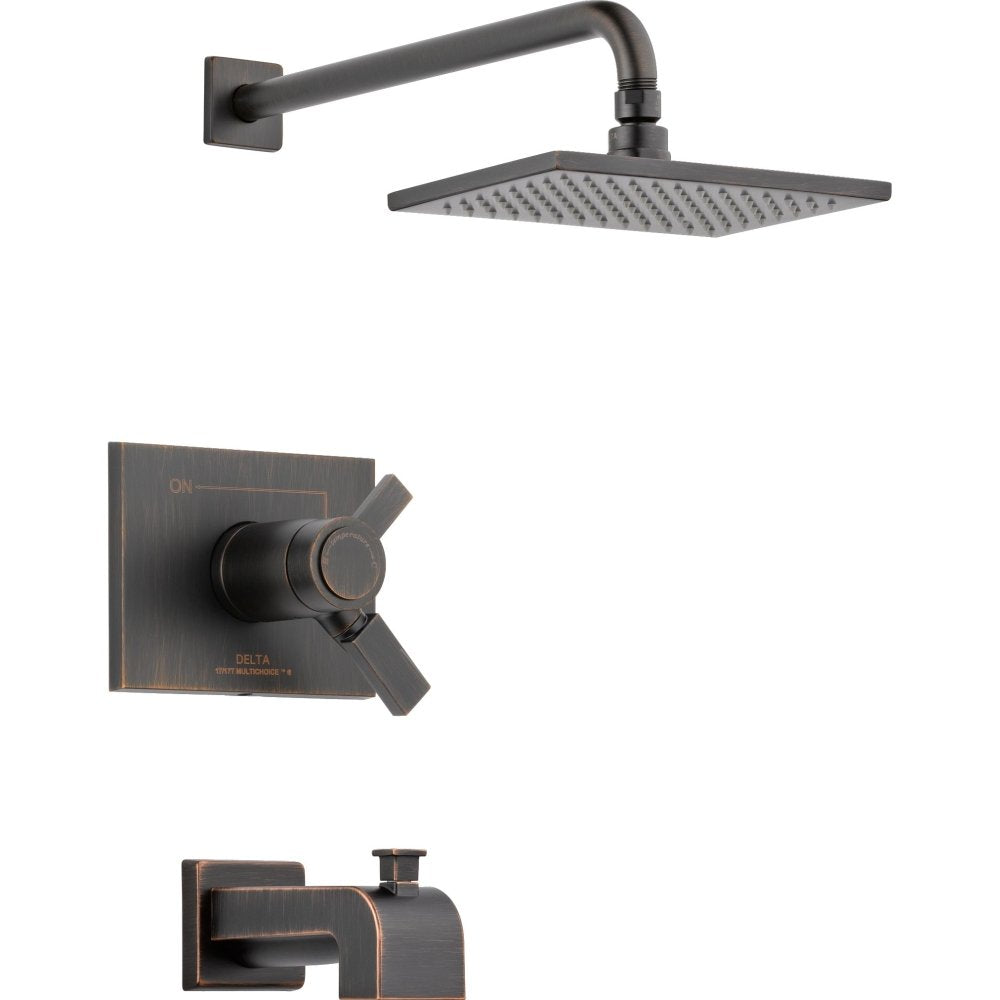 Matte black Delta shower trim with rectangular rainfall showerhead, wall-mounted arm, and valve controls with lever handle.