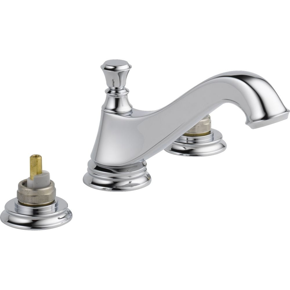 Chrome two-handle bathroom faucet with low arc spout and metal pop-up drain assembly.