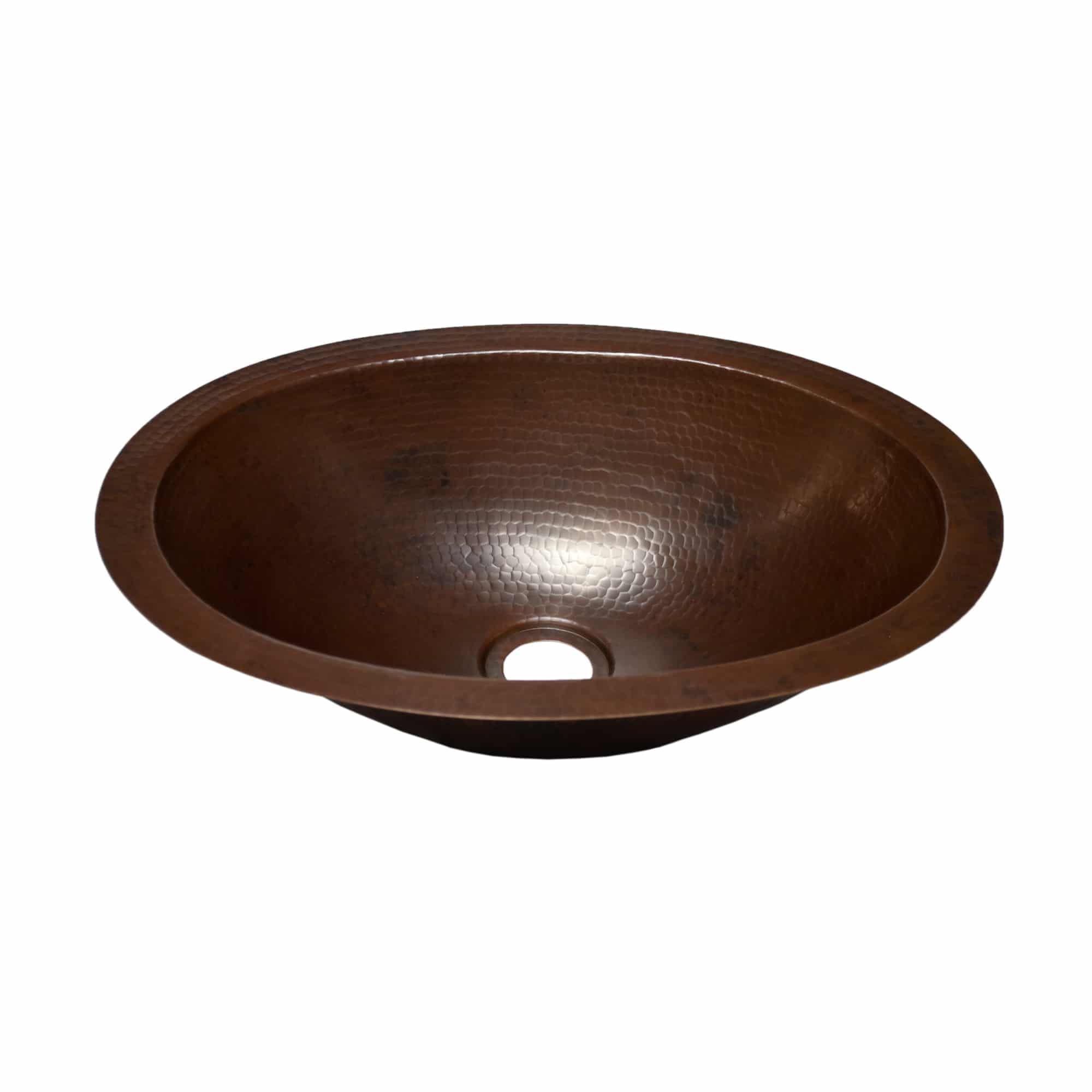 Polished nickel oval sink with hammered copper finish and single drain hole.