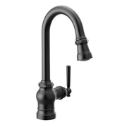 Matte black single-handle pulldown kitchen faucet with curved spout and side lever control.