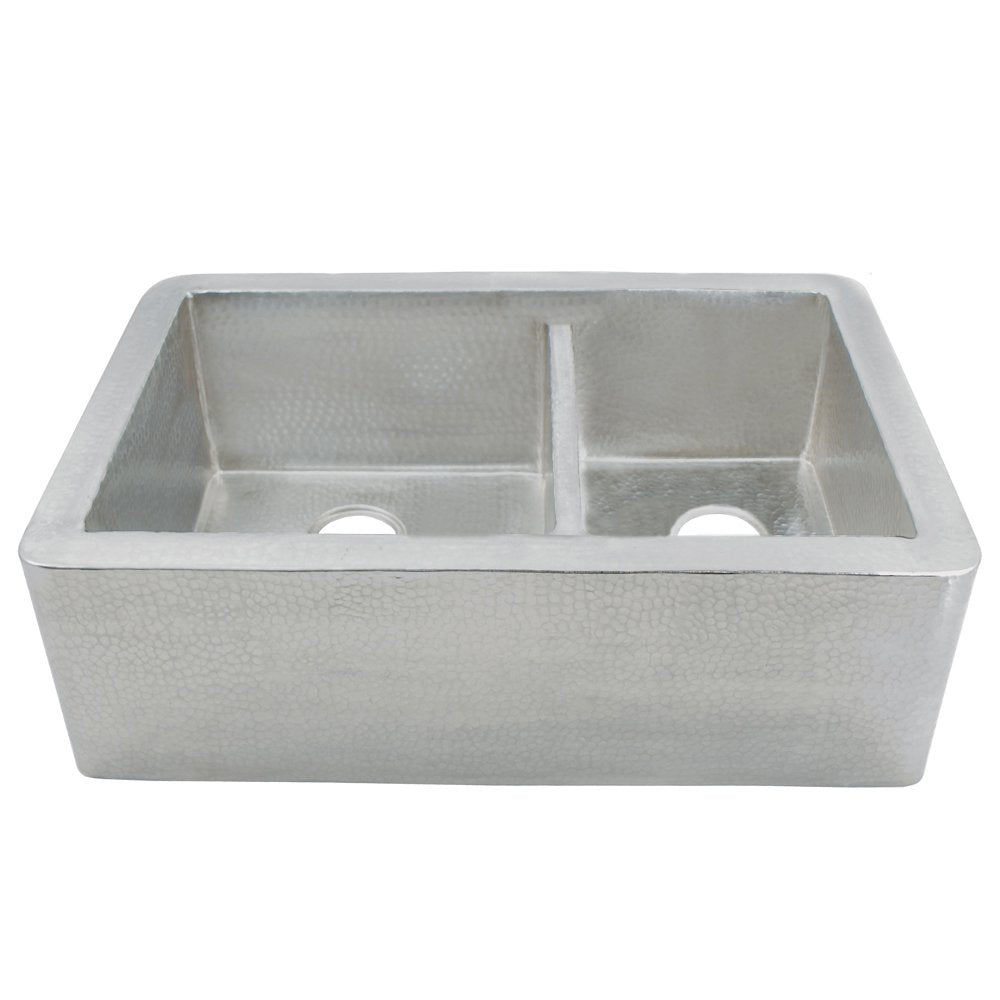 Brushed nickel farmhouse sink with two equal basins and hammered copper interior finish, viewed from above.