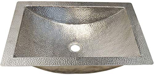 Polished copper undermount bathroom sink with curved basin and hammered texture finish.