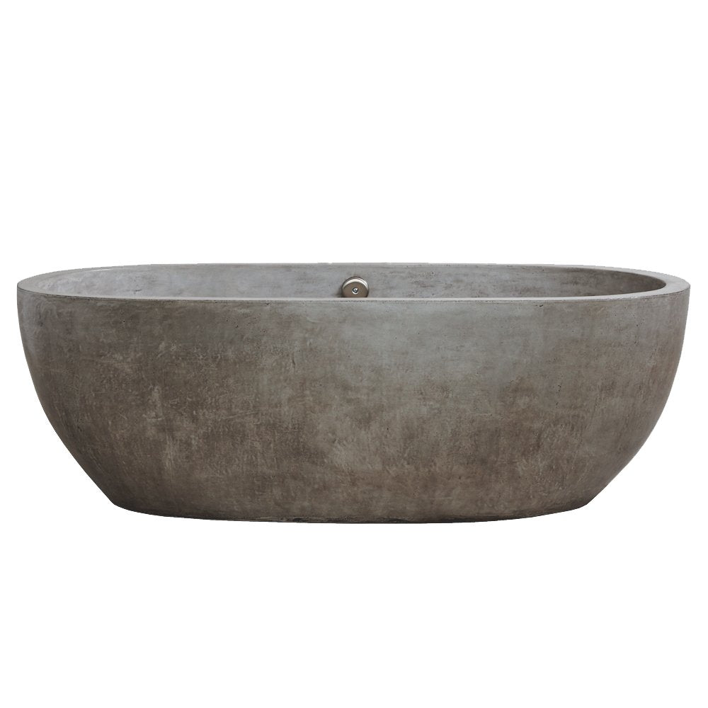 Ash-colored freestanding bathtub with oval shape and textured concrete finish.