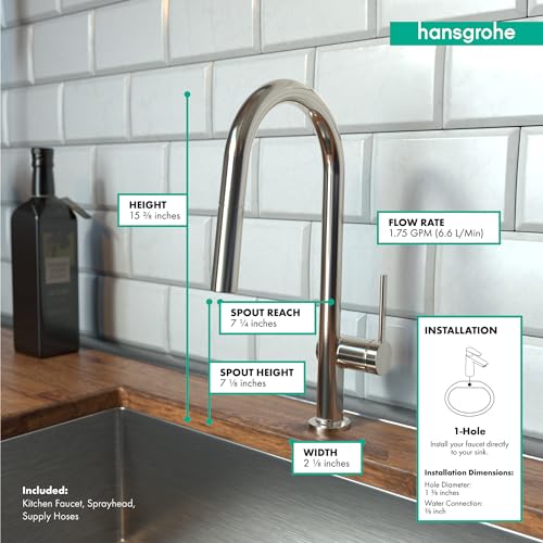 Polished nickel high-arc kitchen faucet with pull-down sprayer mounted on wooden countertop with white tile backsplash.