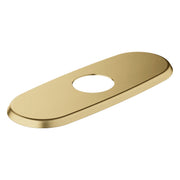 Brushed gold oval escutcheon with center hole for faucet mounting.