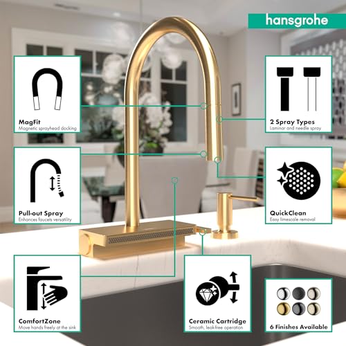 Brushed gold high-arc kitchen faucet with pull-down spray head and magnetic docking, shown in modern kitchen setting.