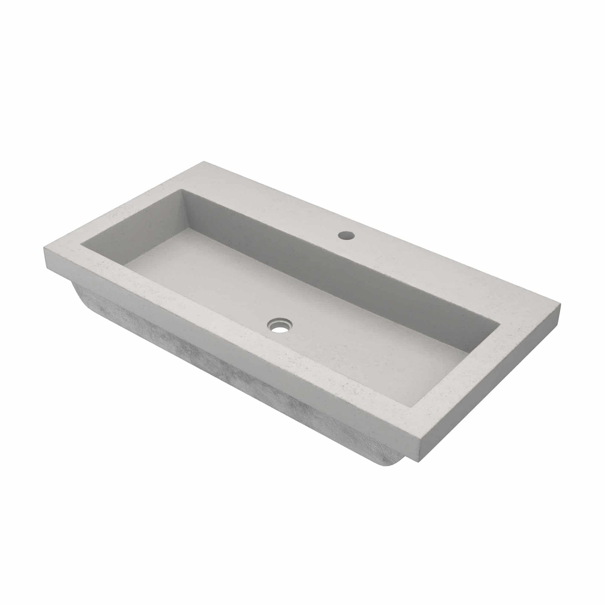 Rectangular ash-colored concrete trough sink with single drain hole and faucet mounting hole.