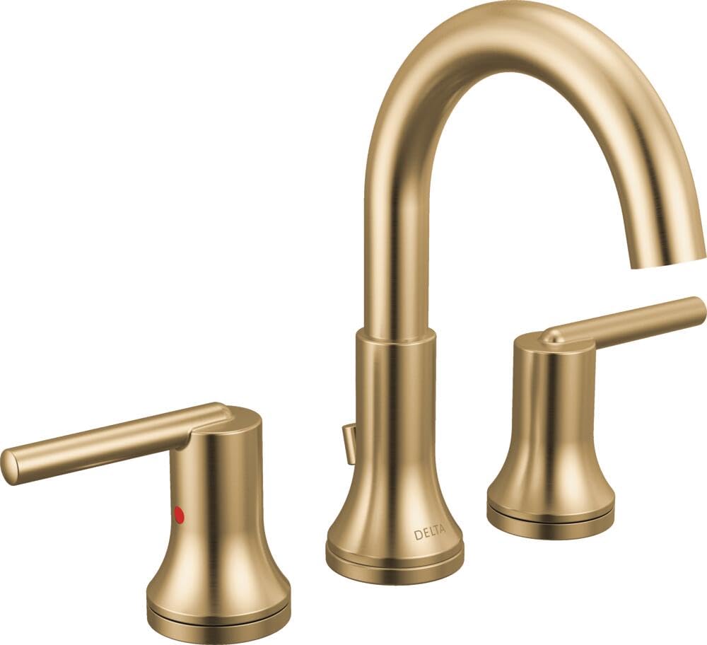 Champagne bronze widespread bathroom faucet with curved spout and two lever handles.