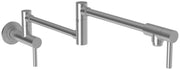 Stainless steel wall-mounted pot filler faucet with linear design, articulating arm, and single lever handle.