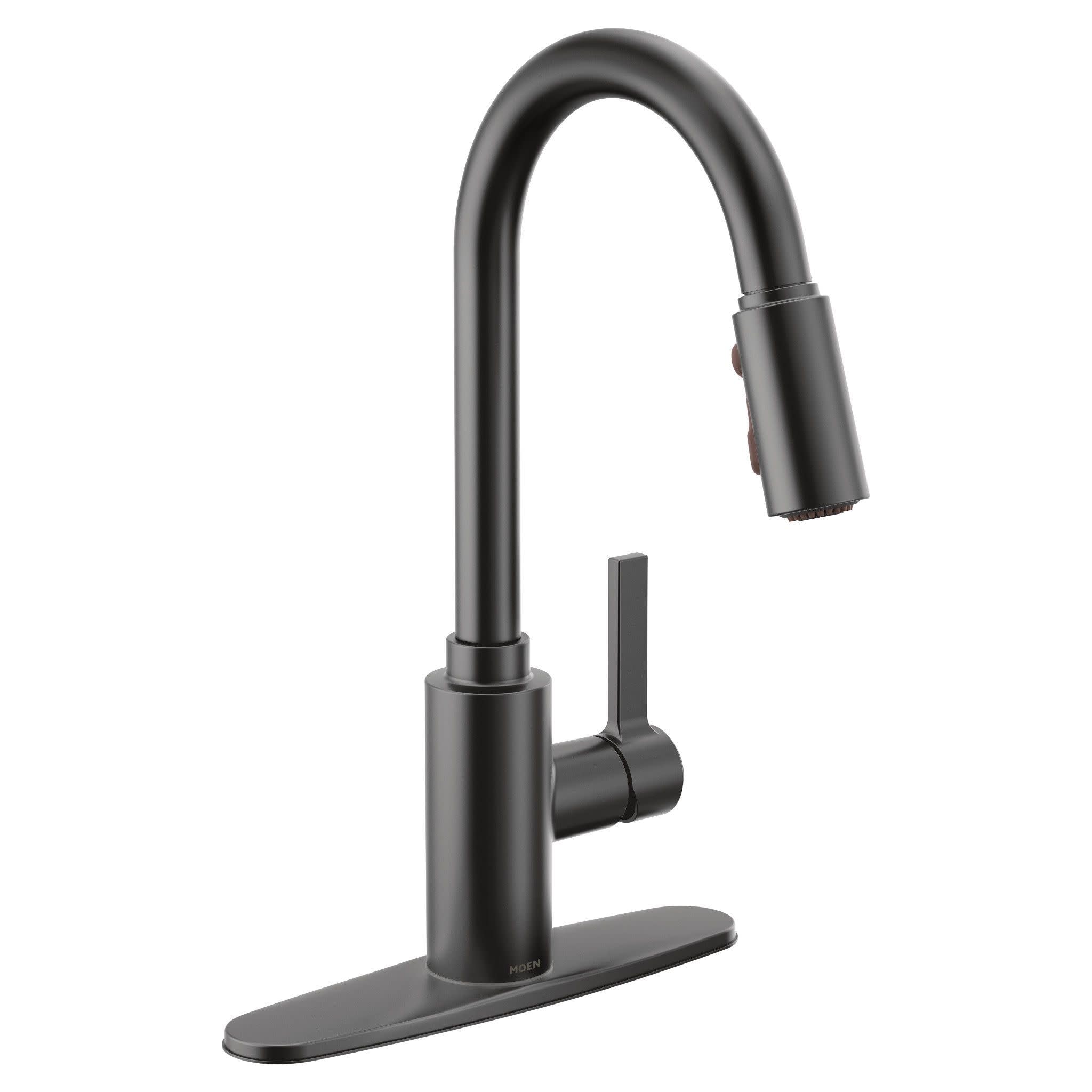 Matte black kitchen faucet with curved spout, single lever handle, and pull-down sprayer head docked in upright position.