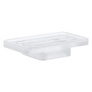 White rectangular soap dish with grooved surface and rounded pedestal base.