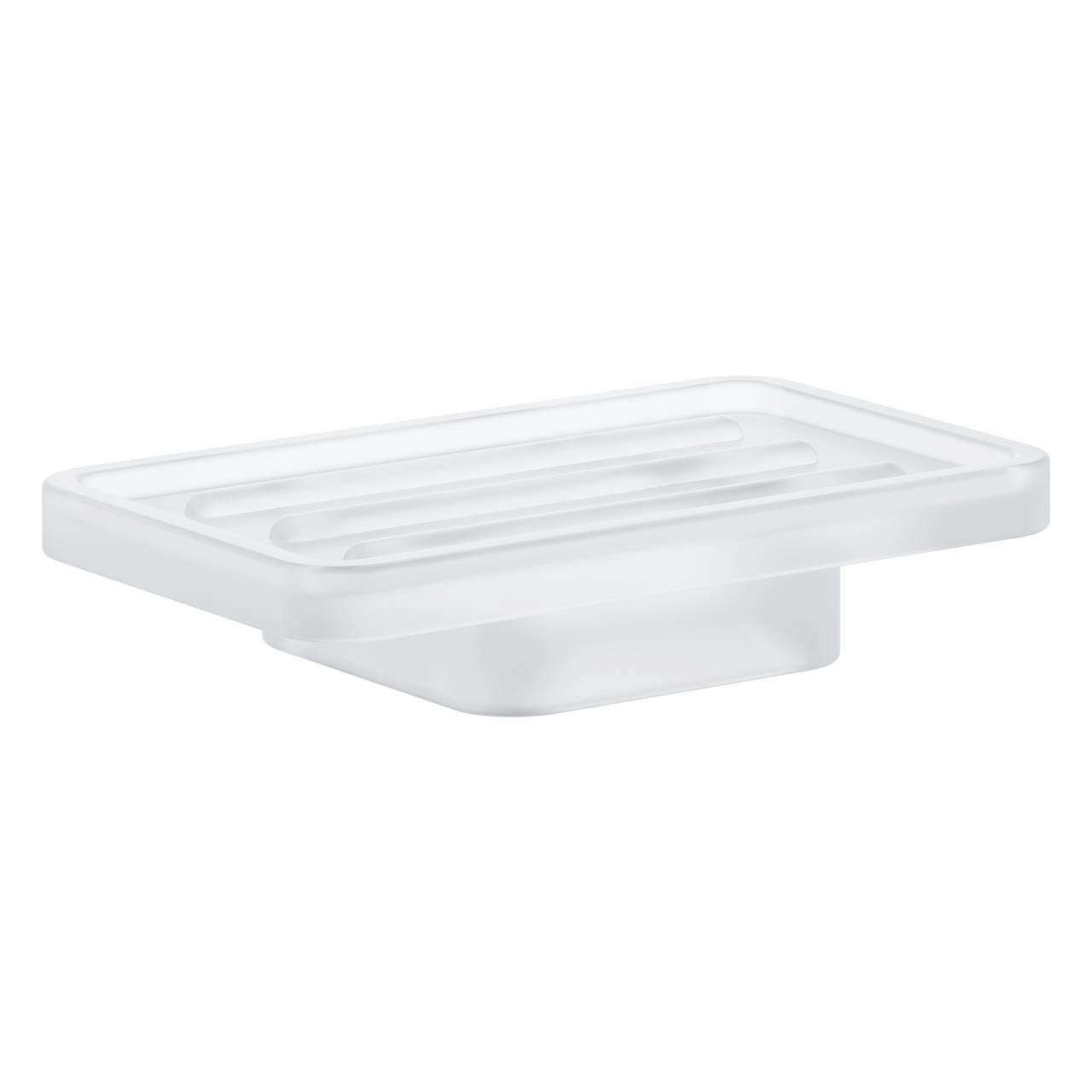 White rectangular soap dish with grooved surface and rounded pedestal base.