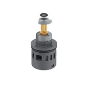 Grohe diverter kit with gray cylindrical body, brass stem, and black rubber seal component, shown in exploded view.