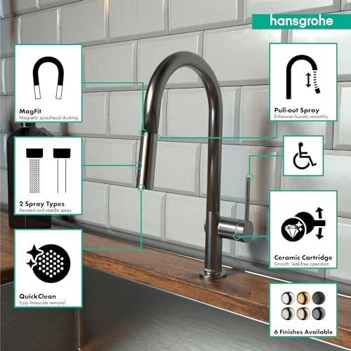 Hansgrohe brushed black chrome high-arc kitchen faucet with pull-down spray head mounted on subway tile backsplash.