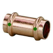 Copper press coupling with threaded ends, two green indicator dots, and open interior showing red seal.