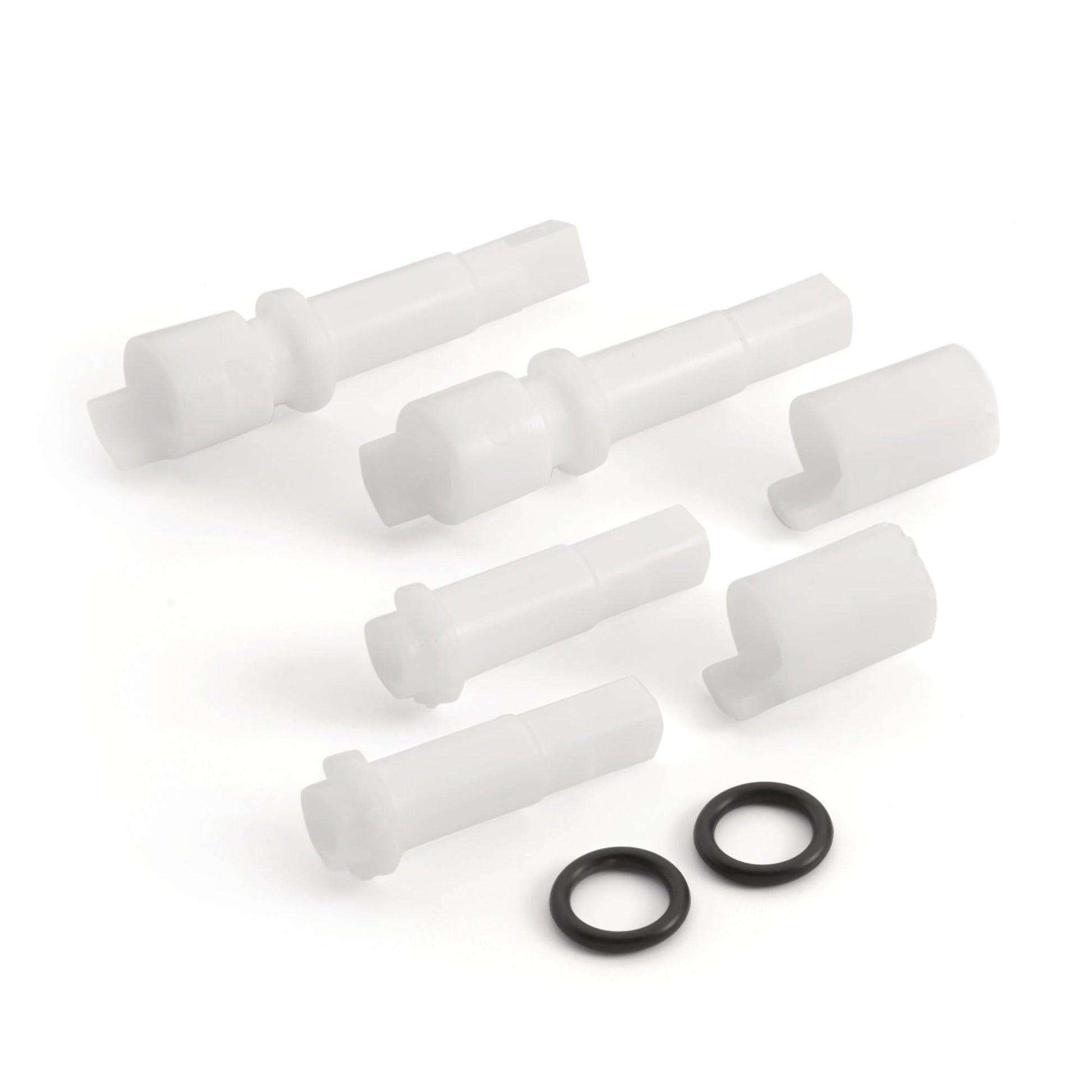 White plastic faucet adapter components and black rubber O-rings arranged on white background.
