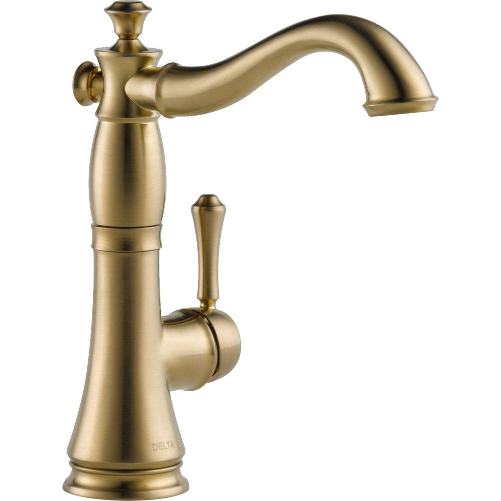 Champagne bronze single handle bar faucet with curved spout and lever control.