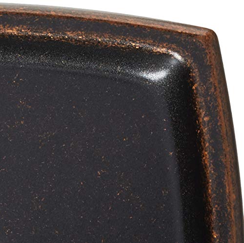 Oil rubbed bronze shower valve trim with distressed finish and textured surface detail.