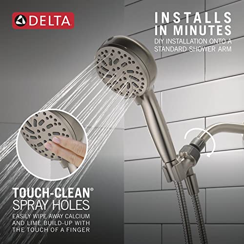 Brushed nickel hand shower with multiple spray holes and cleaning spray feature mounted on shower arm.