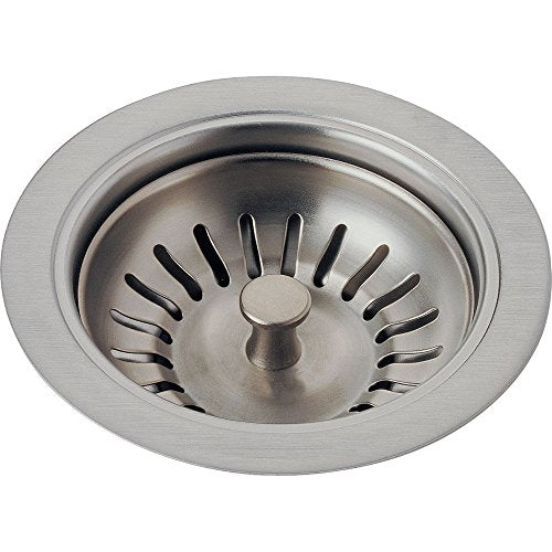 Stainless steel sink strainer with circular flange and radial slot pattern, viewed from above.