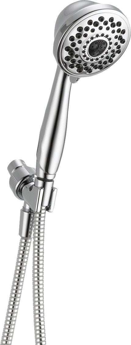 Chrome hand shower with multiple spray holes, attached to wall mount and flexible hose.