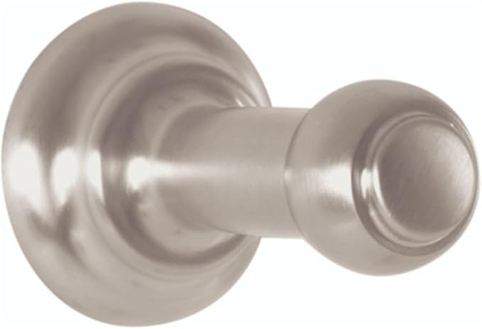 Brushed nickel wall-mounted hook with circular mounting plate and cylindrical protruding hook.
