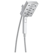 Square chrome shower head with multiple jets and separate handheld wand connected by flexible hose.