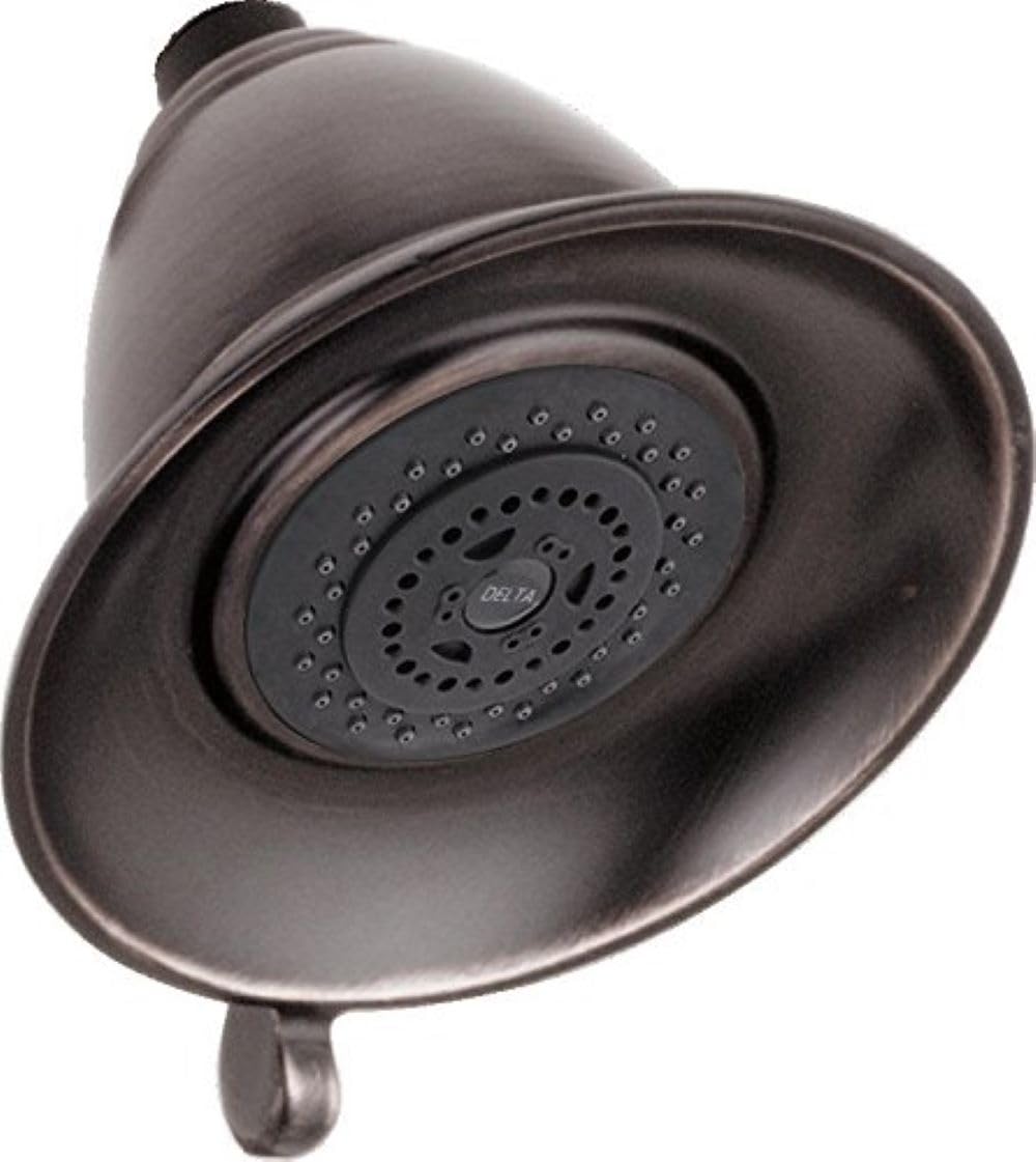 Chrome shower head with oval face plate and multiple spray jets in circular pattern, with adjustment dial and mounting bracke