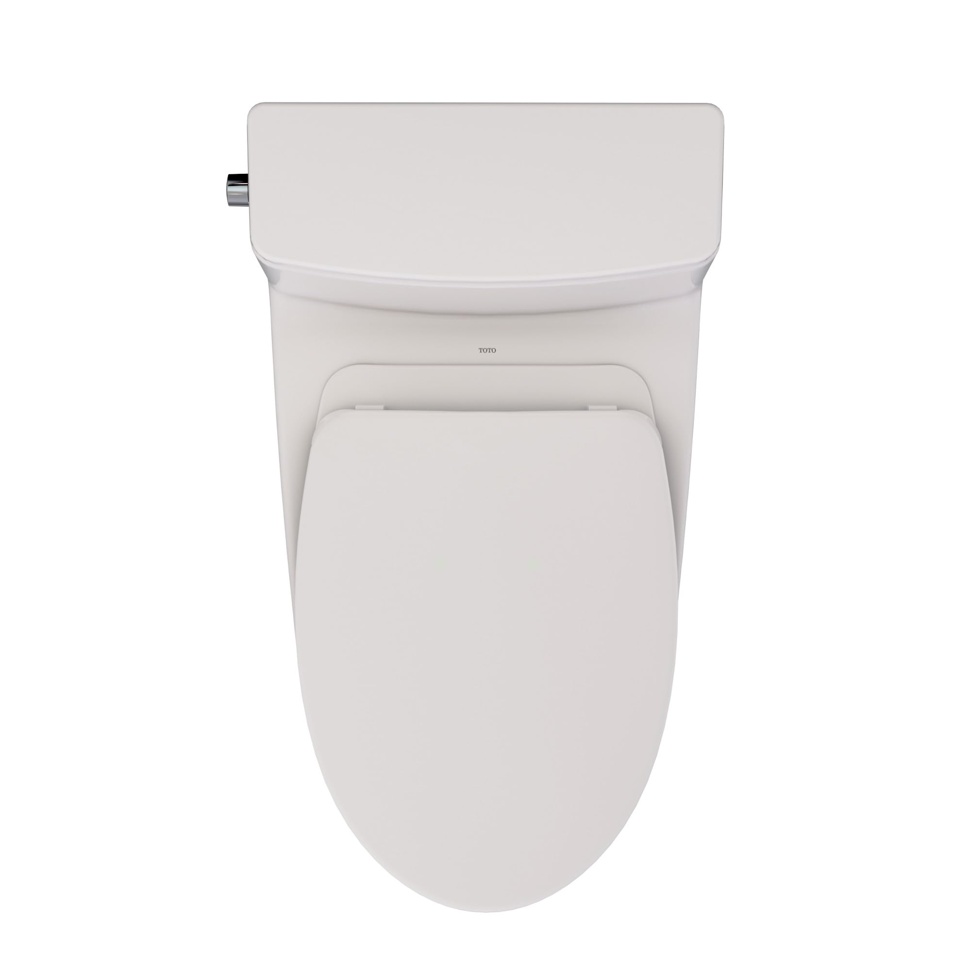 Sedona beige one-piece elongated toilet with closed seat and chrome water supply connector on left side.