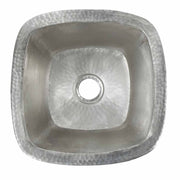 Small square hammered copper bar sink with rounded corners and single drain hole, viewed from above.