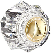 Clear faceted crystal knob with polished brass center insert and valve stem detail.
