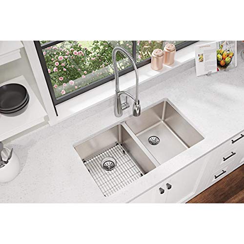 Stainless steel sink grid with rectangular pattern, fits left basin of double sink.