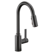 Matte black single-handle kitchen faucet with arched spout and pull-down sprayer head.