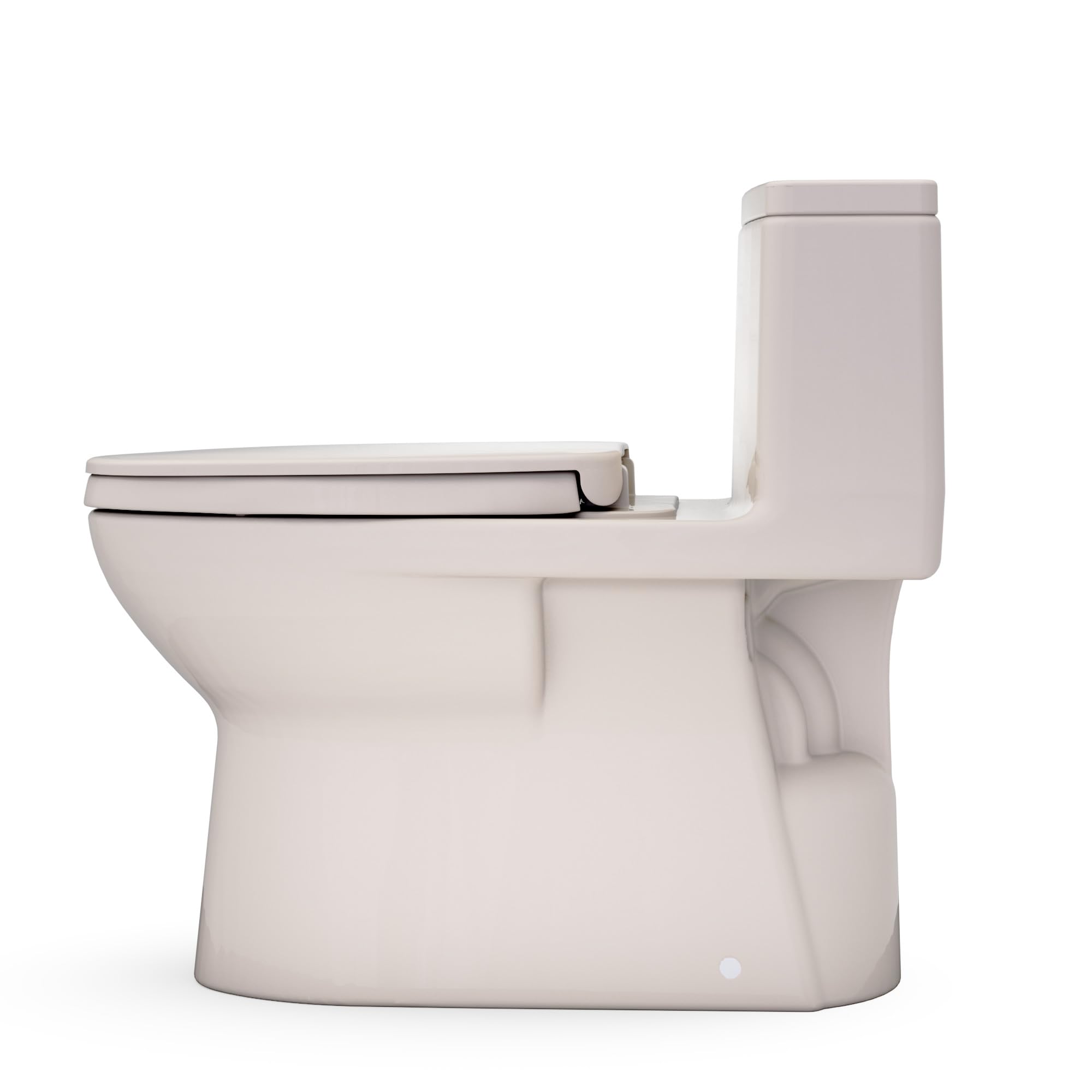 Bone-colored one-piece elongated toilet with closed soft-close seat lid and integrated tank.