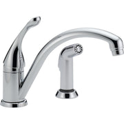 Chrome single-handle kitchen faucet with curved spout and separate spray attachment on base.