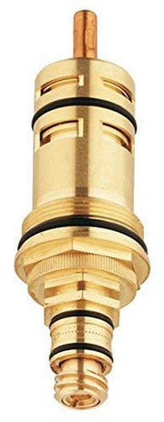 Brass thermostatic cartridge with copper stem and black rubber seals stacked in cylindrical sections.