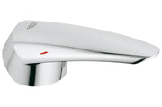 Chrome faucet lever with Grohe branding and red indicator dot on white handle.