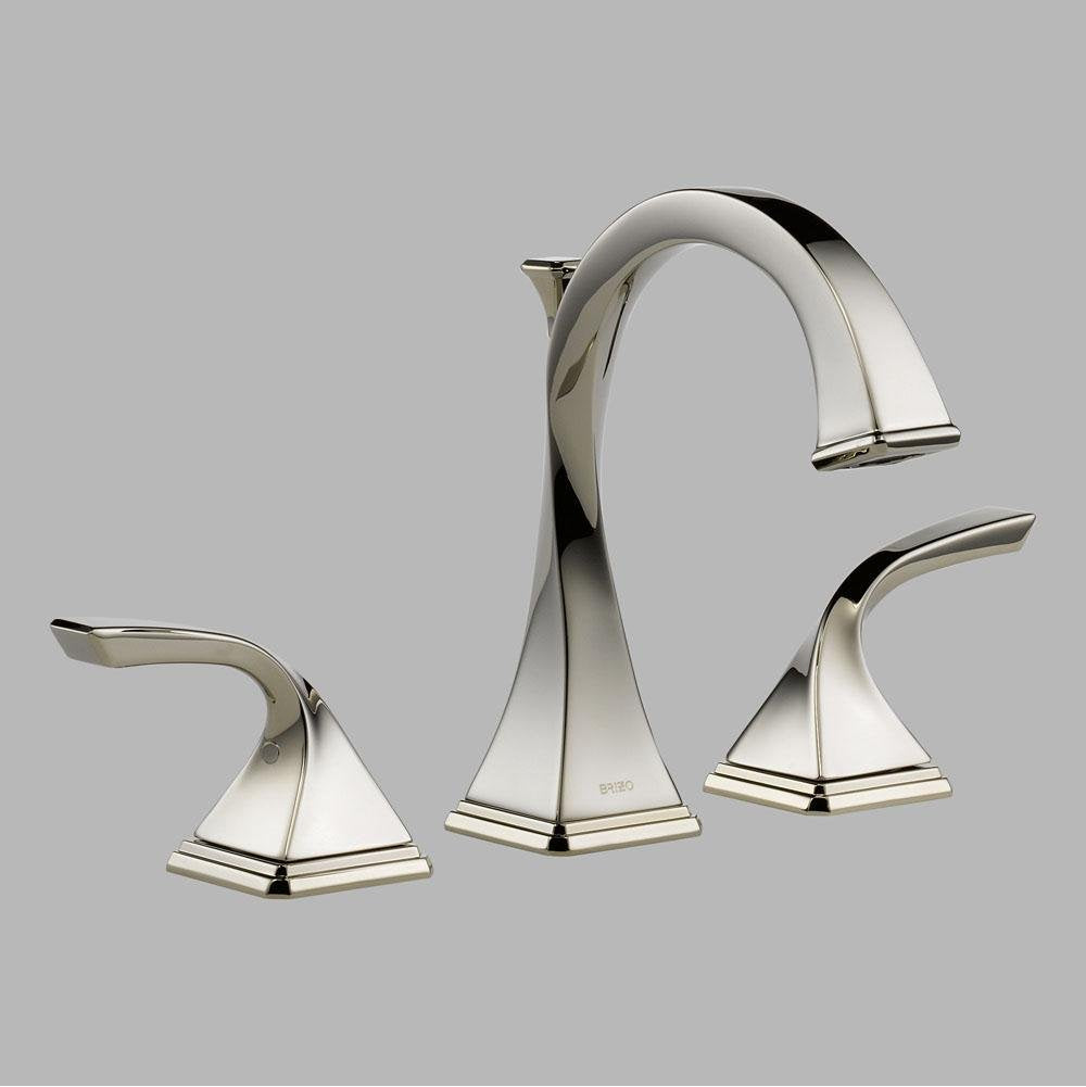 Chrome widespread bathroom faucet with curved spout and two curved handles with square bases.