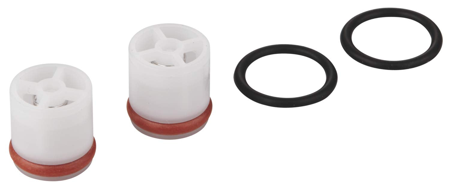 Grohe non-return valve repair kit with white cartridges, red seals, and black rubber O-rings.