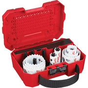 Red plastic case containing 11 Milwaukee hole saws in various sizes with white cutting surfaces and black arbors.
