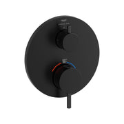 Matte black circular thermostatic valve trim with two round handles, temperature display showing 100°F and 38°C, and Grohe SP