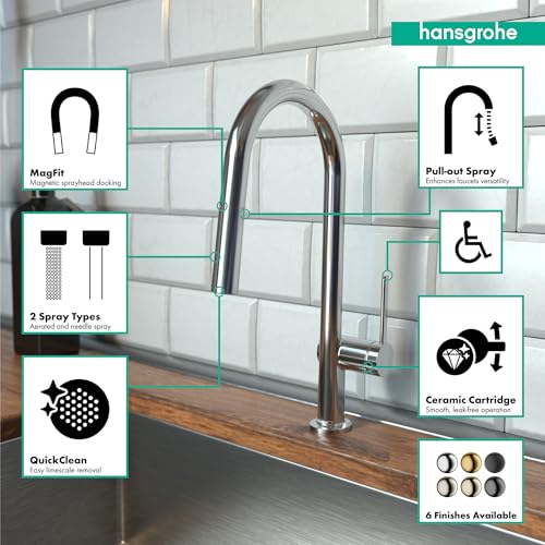 Chrome high-arc kitchen faucet with pull-down spray head and curved spout mounted on wood countertop.