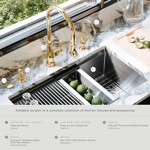 Polished nickel pull-down kitchen faucet with curved spout mounted on marble countertop above dual sink basin.