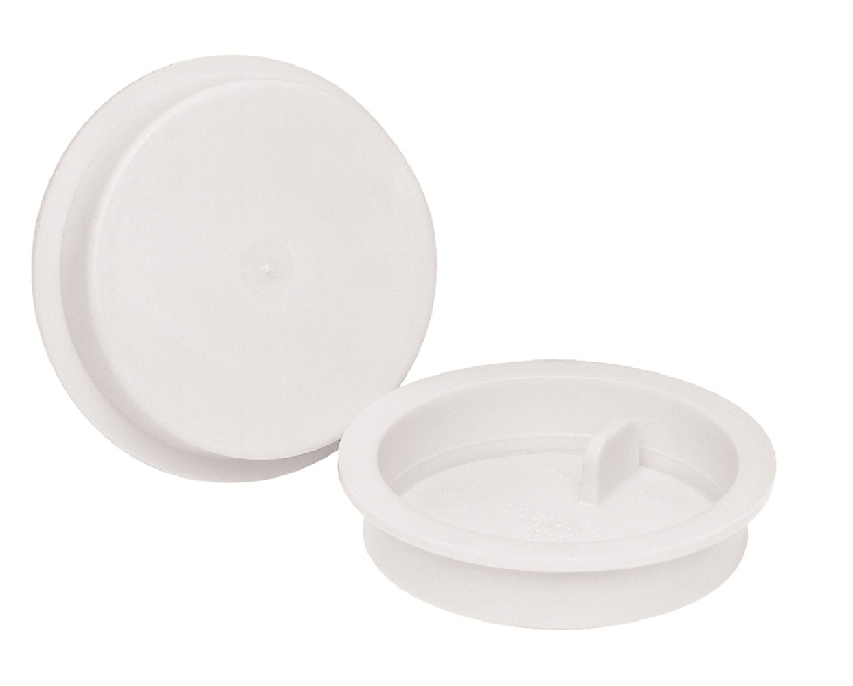 White plastic 3-inch knockout test caps with flat and recessed designs shown from two angles.