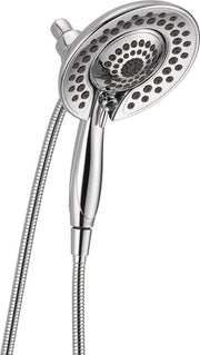 Dual chrome shower heads with multiple spray holes, connected by flexible hose with handheld sprayer attachment.