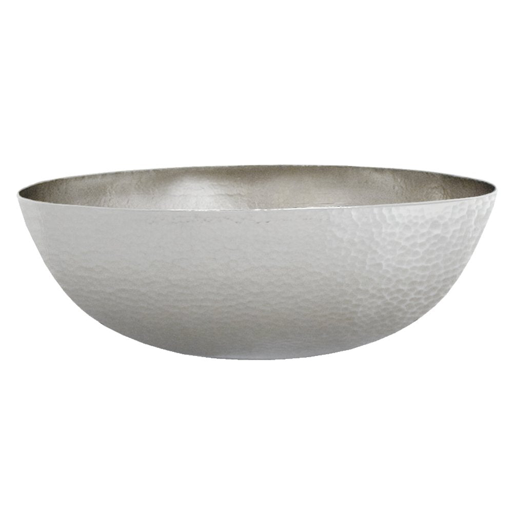 Oval hammered copper vessel sink with antique finish and textured surface.